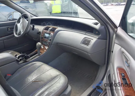 2000 Toyota Avalon Xls z USA, uszkodzony, nr VIN 4T1BF28B7YU090675